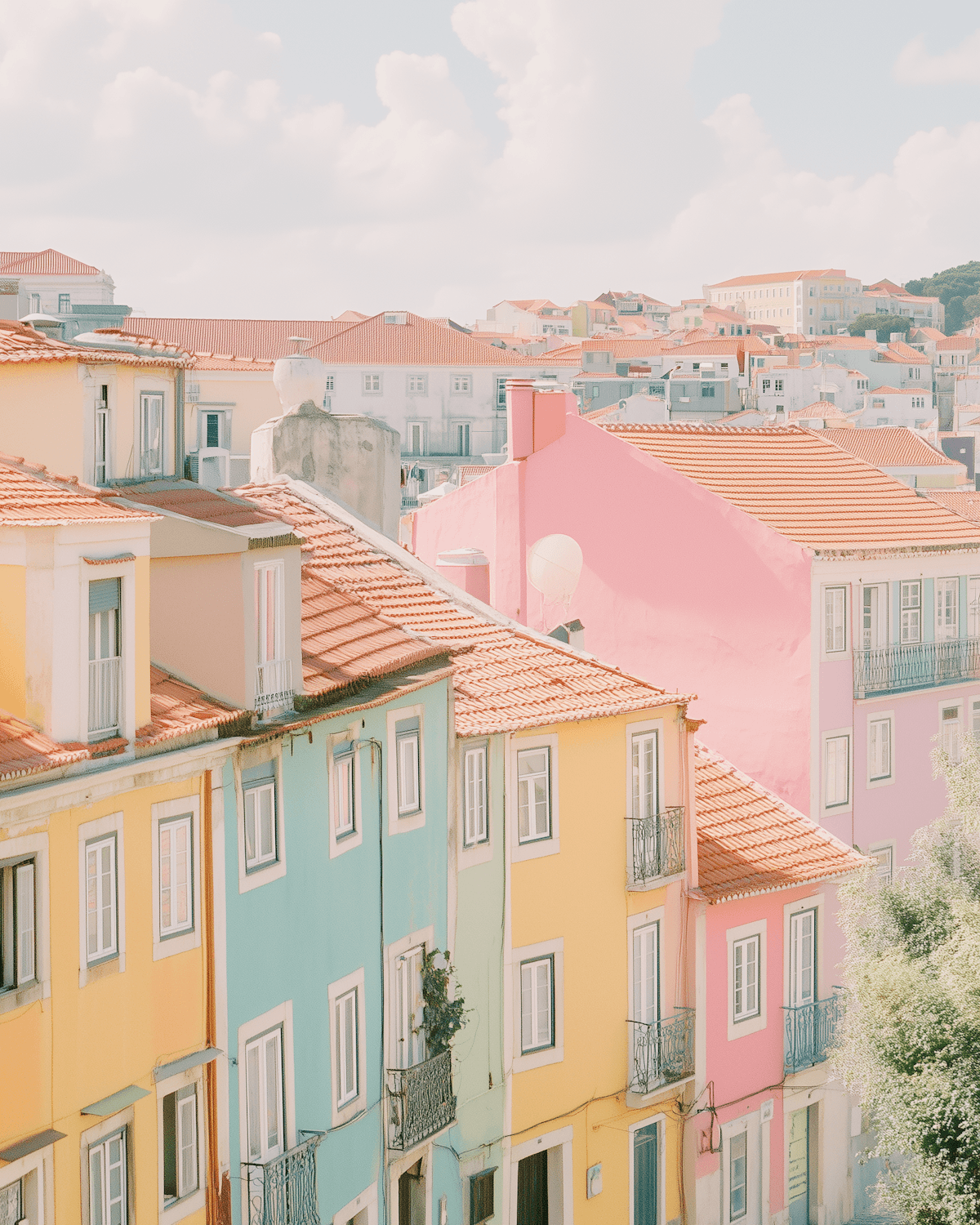 Pastel houses and terracotta rooftops in Lisbon